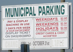 parking sign in town municipal parking lot